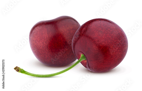Two fresh cherries isolated on white background