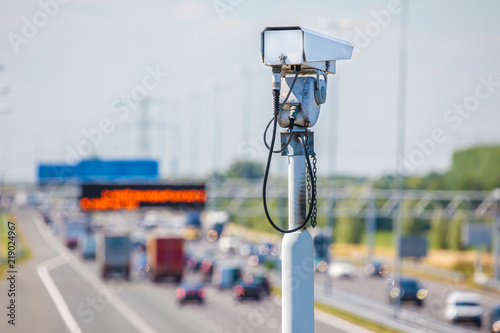 Surveillance camera in front of a Dutch highway photo