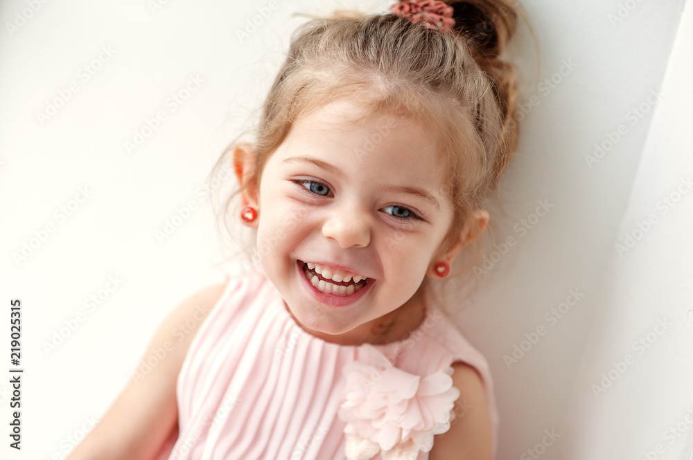 Little girl with blue eyes and a beautiful smile Little girl with blue eyes and a beautiful smile