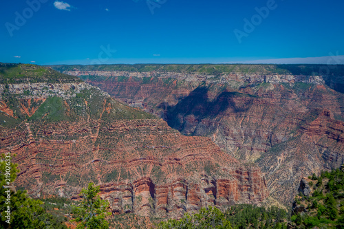 High cliffs above Bright Angel canyon, major tributary of the Grand Canyon, Arizona, view from the north rim photo