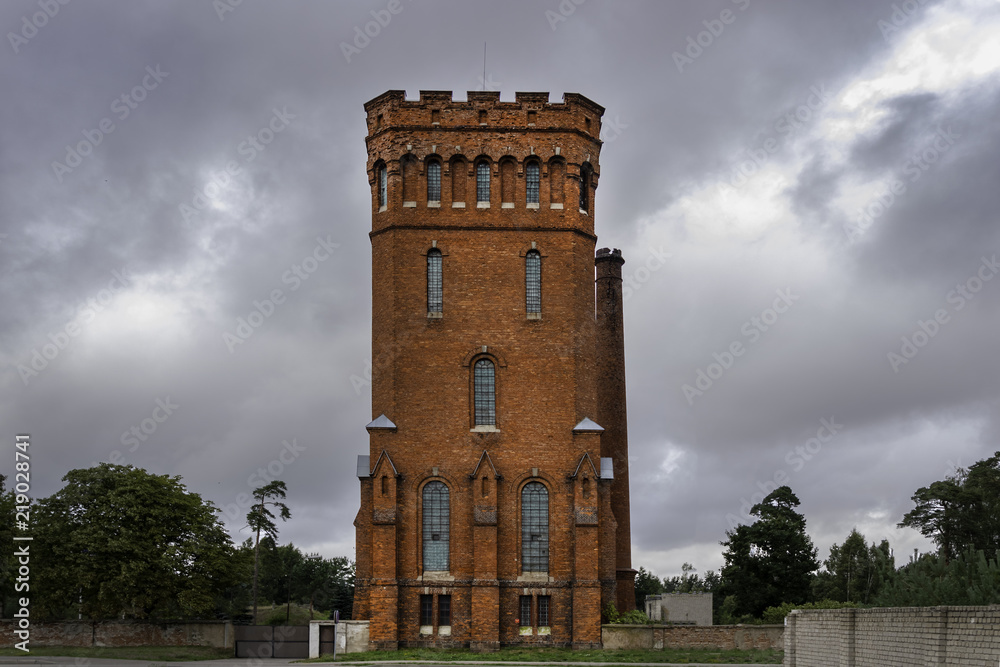 old water tower of red stone