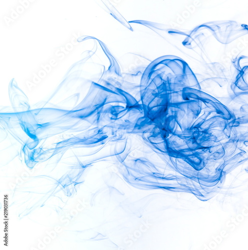 Blue smoke on white background © yauhenka