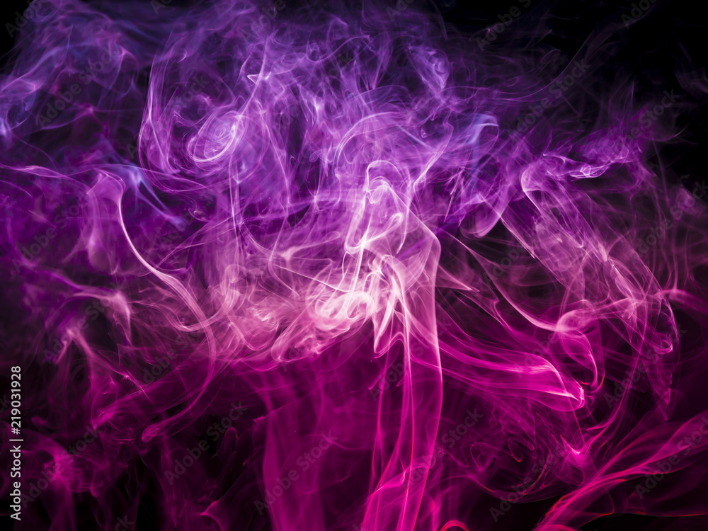 Colored smoke on black background Colored smoke on black background