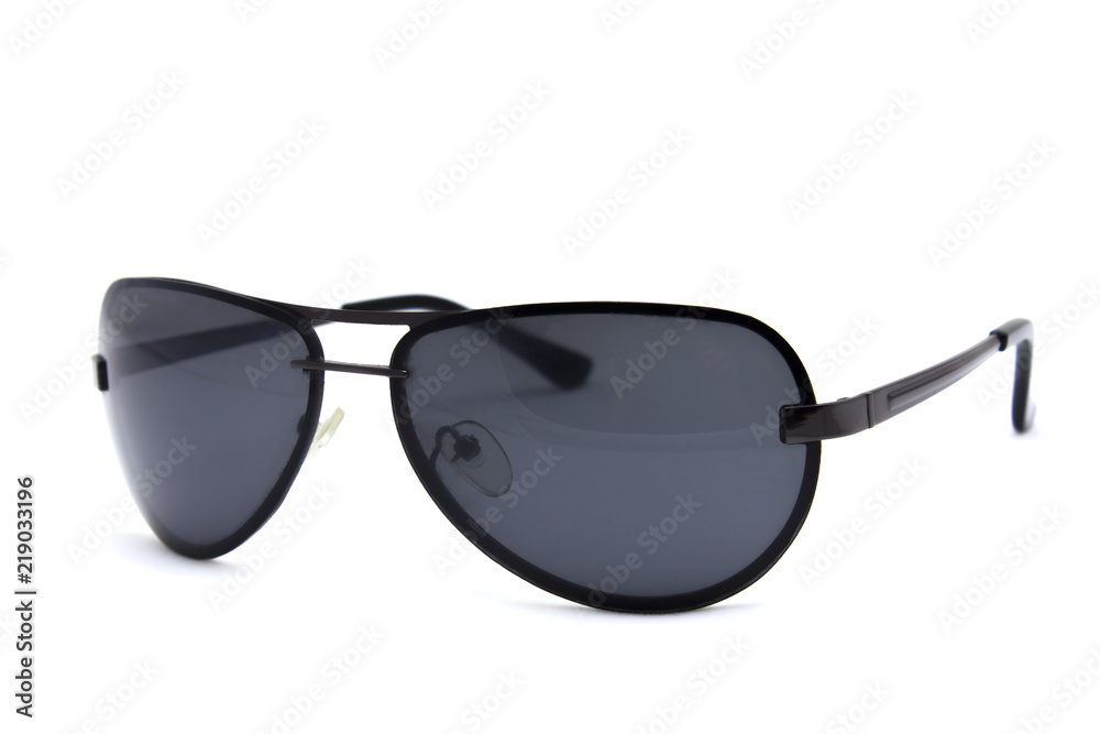 Sunglasses with dark lenses on a white background Sunglasses with dark lenses on a white background