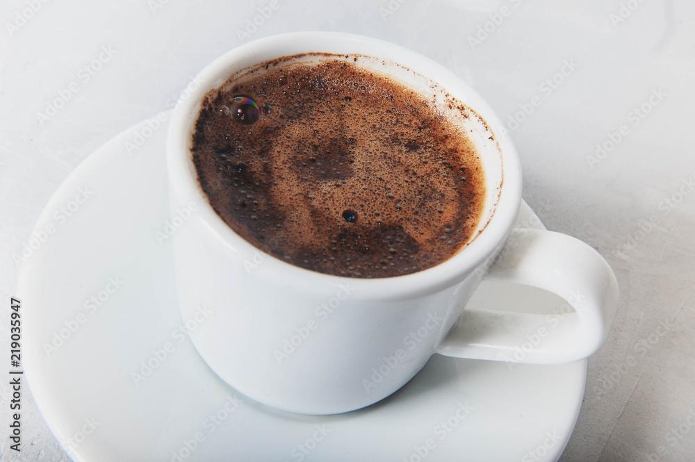 Coffee cup and saucer on a white background. Coffee cup and saucer on a white background.