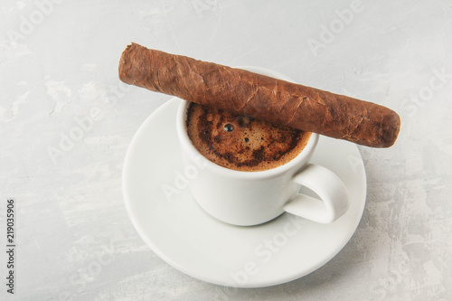 Cup and Turk coffee, cigar and guillotine isolated on white background.