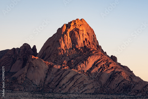 Close up of rock patterns of granite mountain at sunrise in Spitzkoppe, Namibia photo