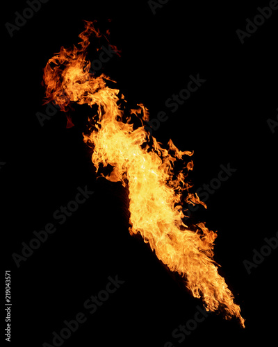Long narrow flame isolated on black, dragon breath