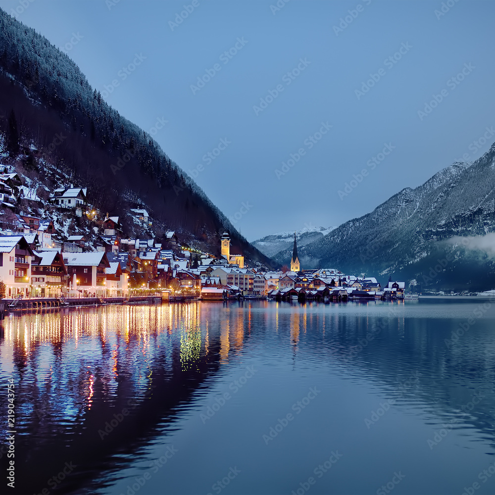 Night winter scenic view of village of Hallstatt in the Austrian Alps