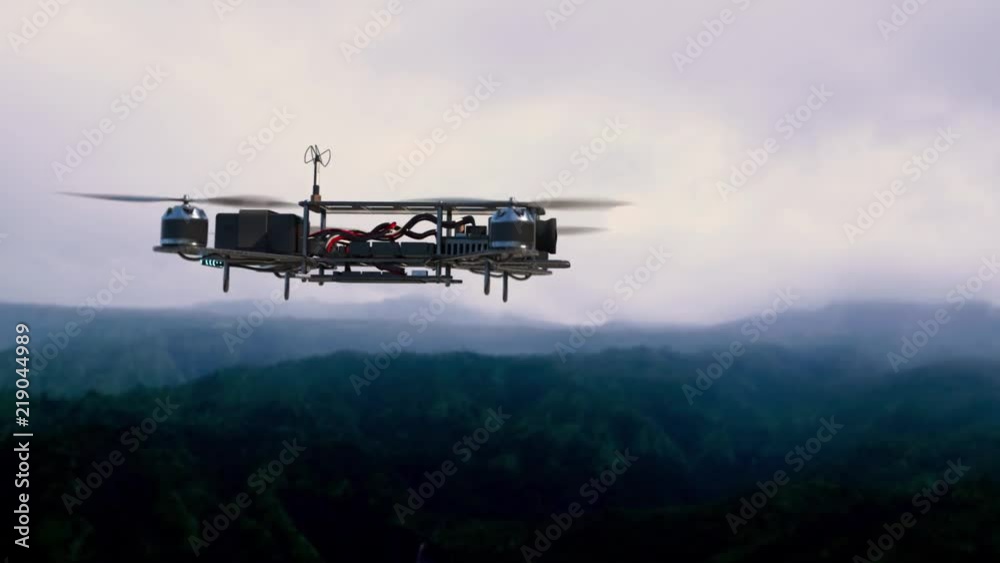 An aerial view of a racing drone flies above a tropical island. An aerial view of a racing drone flies above a tropical island.