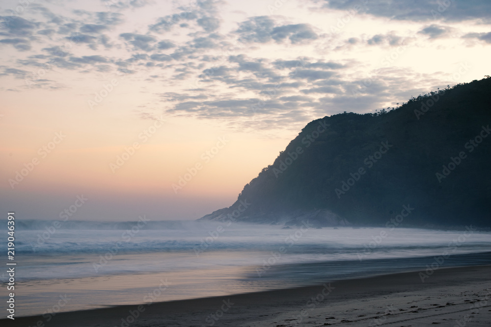 Obraz premium Beach colorful sunset long exposure