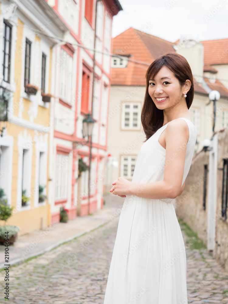 attractive asian woman traveling in europe