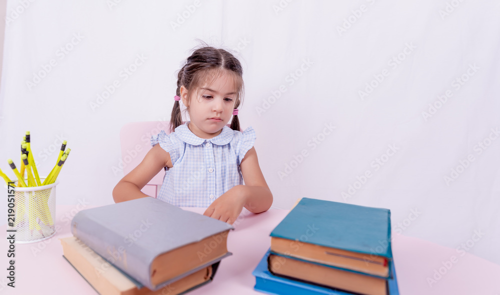 Portrait of cute little girl in school uniform Portrait of cute little girl in school uniform