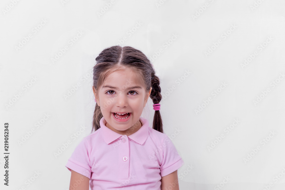Portrait of cute little happy girl in school uniform Portrait of cute little happy girl in school uniform