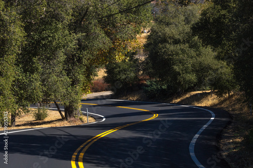 Two lane, winding paved country road in southern califonia
