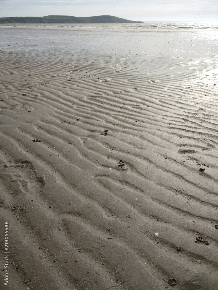 Fototapeta premium Arena mojada en la playa de Weston-super-Mare