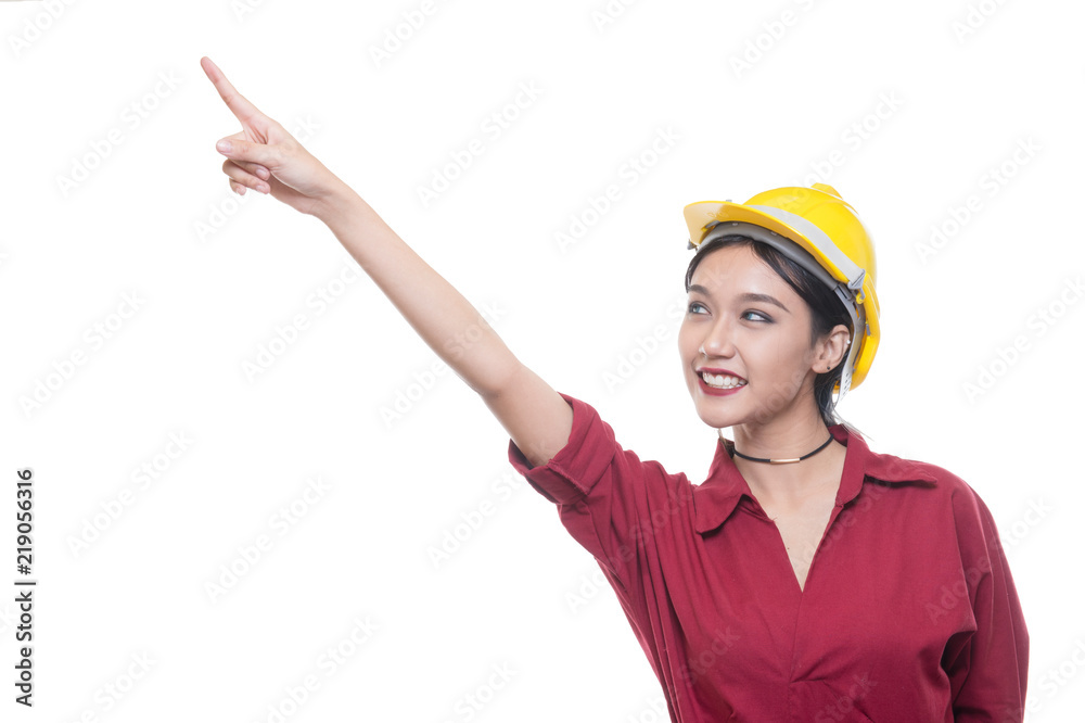 Engineering woman pointing in red shirt with yellow safety helmet in Studio light, occupation concept, Construction preparation, Happy worker Engineering woman pointing in red shirt with yellow safety helmet in Studio light, occupation concept, Construction preparation, Happy worker