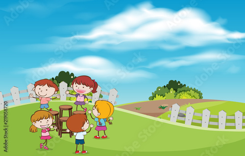 Children play musical chairs game