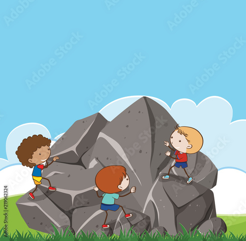Children climbing up rock scene