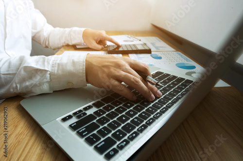 Businessmen calculate earnigs business performance, business concept . photo