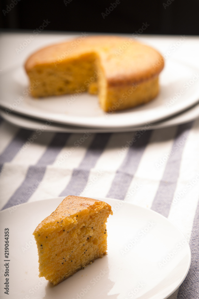 Orange poppy seed cake with depth of field