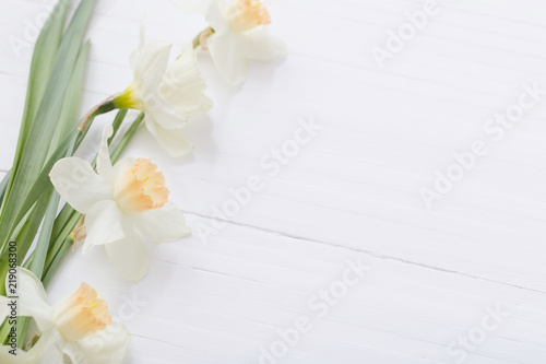 Fototapeta Naklejka Na Ścianę i Meble -  white narcissus on white wooden background
