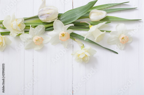 Fototapeta Naklejka Na Ścianę i Meble -  white narcissus on white wooden background