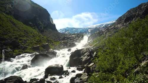 River from Buarbreen glacier in Folgefonna national park Norway. photo