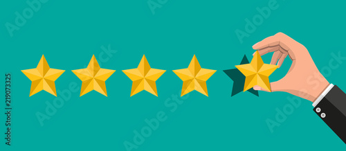 Hand puts rating. Reviews five stars. Testimonials, rating, feedback, survey, quality and review. Vector illustrayion in flat style photo
