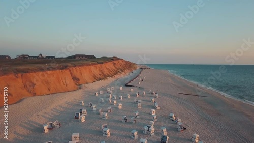 Aerial shot of the beach in sunset photo