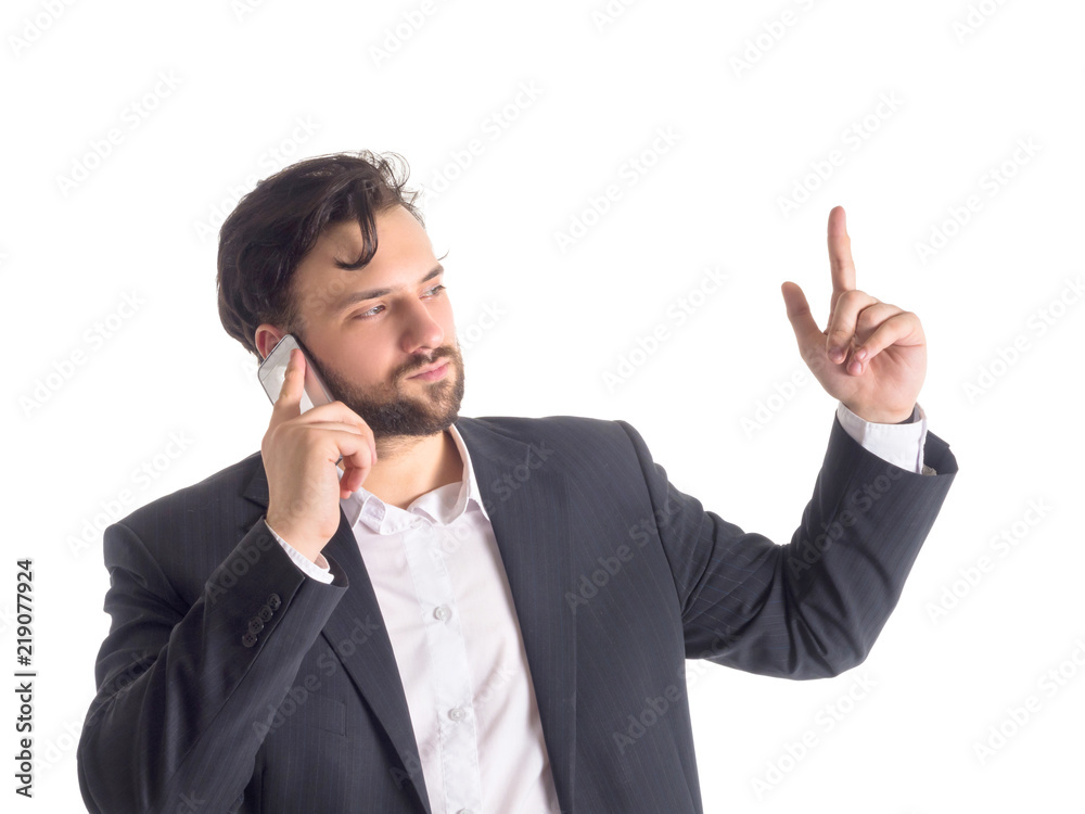 Young smiling businessman talking on mobile isolated on white background. Young smiling businessman talking on mobile isolated on white background.