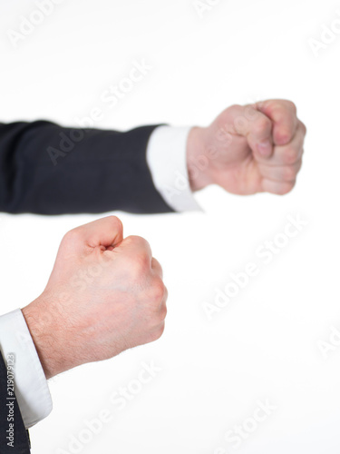 Fists of a businessman. He is ready to fight