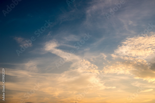 blue sky with slightly colored clouds © schillermedia