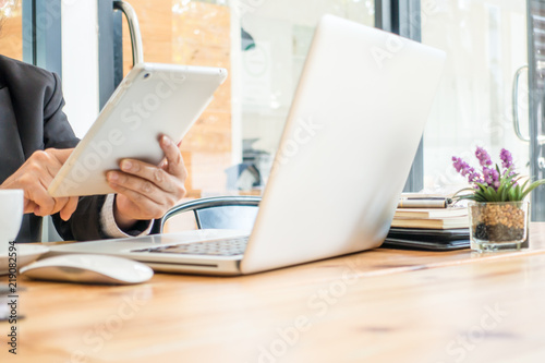 Businessman working at business office table. Selective focus.