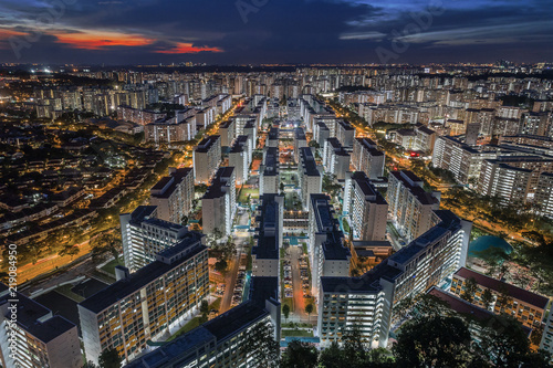 Aerial view of concrete jungle like HDB apartments in Singapore at night © PRADEEP RAJA