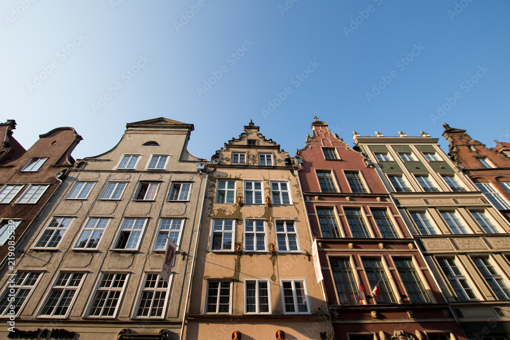 Fototapeta premium colorful houses in the center of gdańsk, typical pointed roofs of the local architecture. colorful houses in the north of Poland in the summer