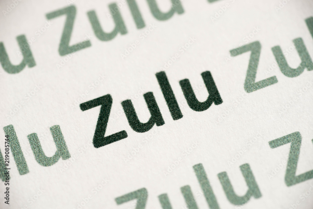 word Zulu language printed on paper macro
