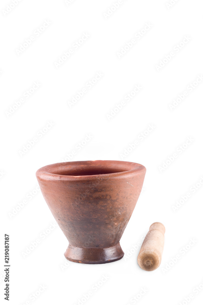 baked clay mortar and wood pestle on white background cooking kitchenware object isolated
baked clay mortar and wood pestle on white background cooking kitchenware object isolated
