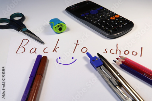 A beautiful text written on white background. Back to school. Children back in september