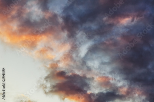 Beautiful bright sunset sky with pink clouds, natural abstract background and texture, heaven, religion © olezzo