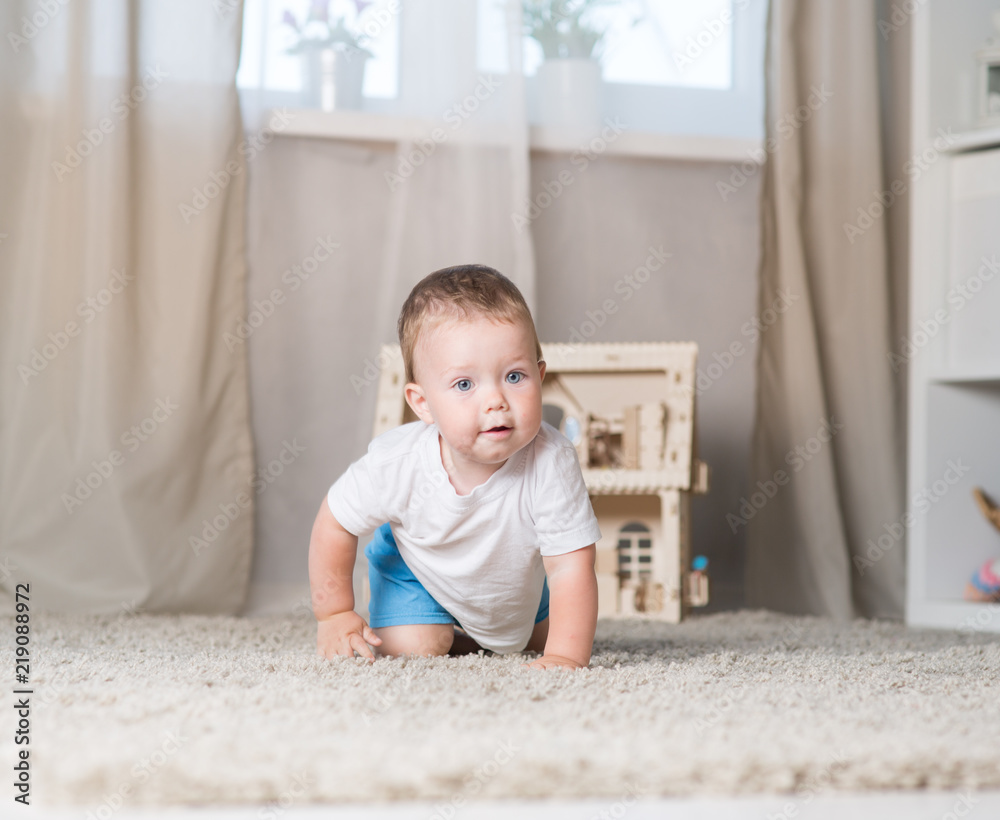 The kid is playing in the room