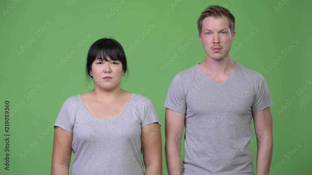 Young multi-ethnic couple together Young multi-ethnic couple together