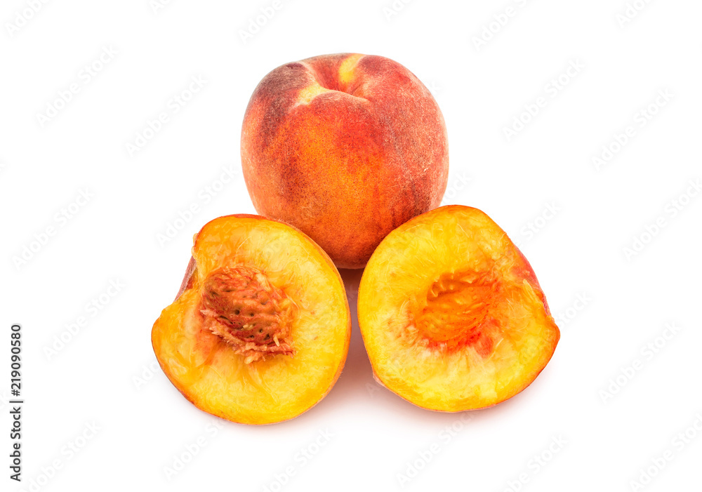 Halves of peach with whole peach on white. Halves of peach with whole peach on white.