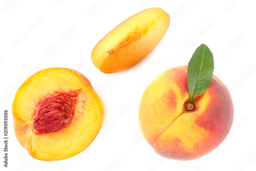 peach fruit with green leaf and slices isolated on white background. top view peach fruit with green leaf and slices isolated on white background. top view