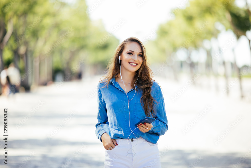 Close-up portrait of beautiful caucasian woman with charming smile walking outdoors Close-up portrait of beautiful caucasian woman with charming smile walking outdoors