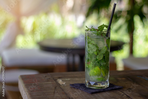 mojito cocktail on wooden background