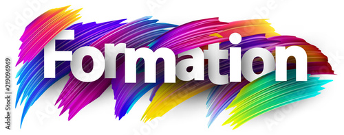 Formation sign with colorful brush strokes.