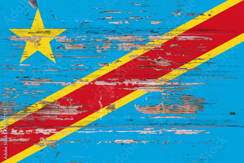 National flag of Democratic Republic of the Kongo on a dull wooden background