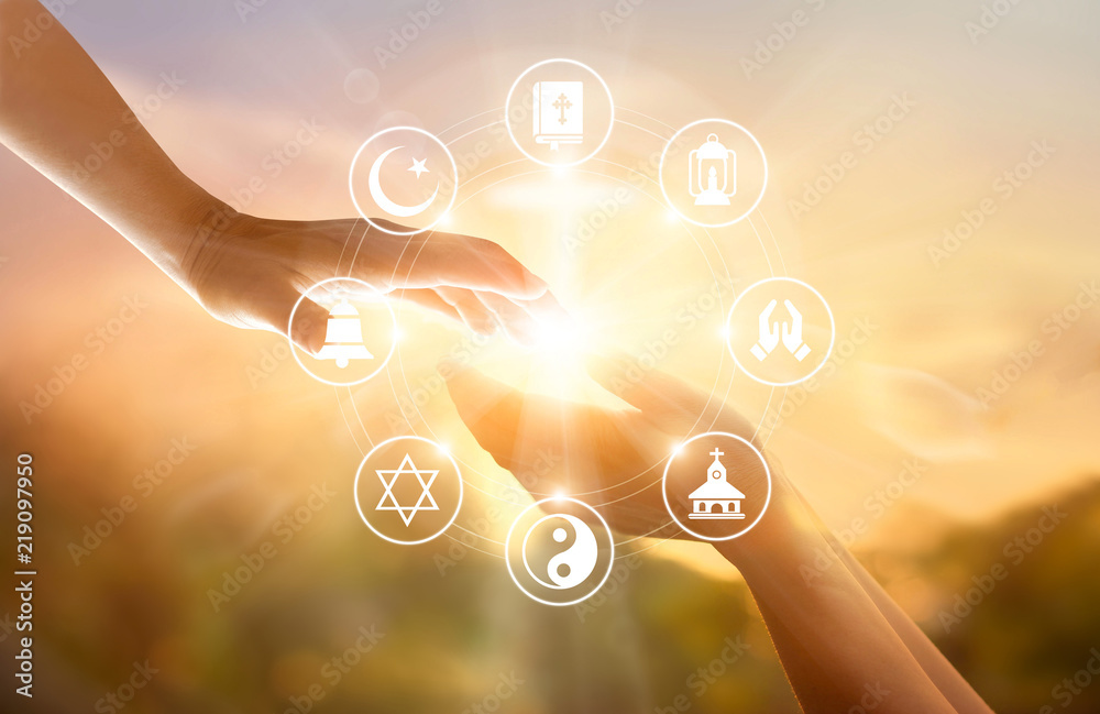 Fototapeta premium Religion concept. Human hands together forgives and blesses. Praying and religions icon on sky sunset background