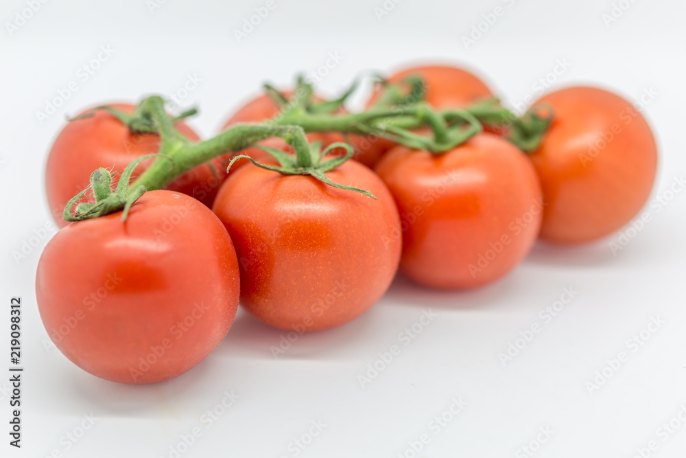 Ripe, red tomatoes, with a shallow depth of field Ripe, red tomatoes, with a shallow depth of field
